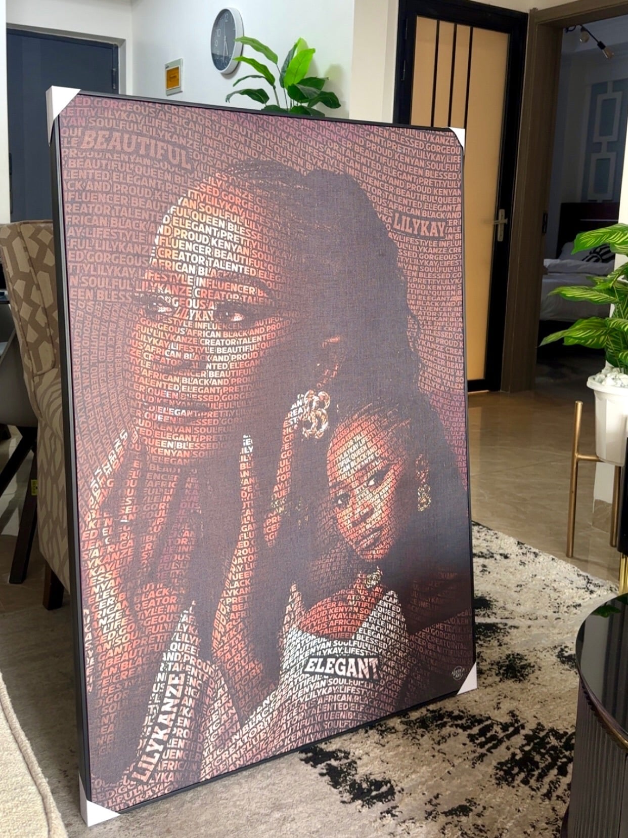 Large framed personalized typography portrait shown in a home